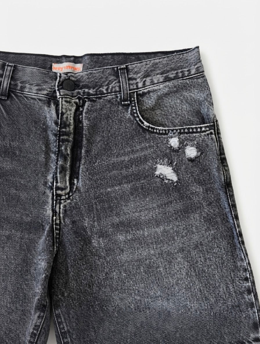 TANGERI jeans baggy fit con abrasioni cenere