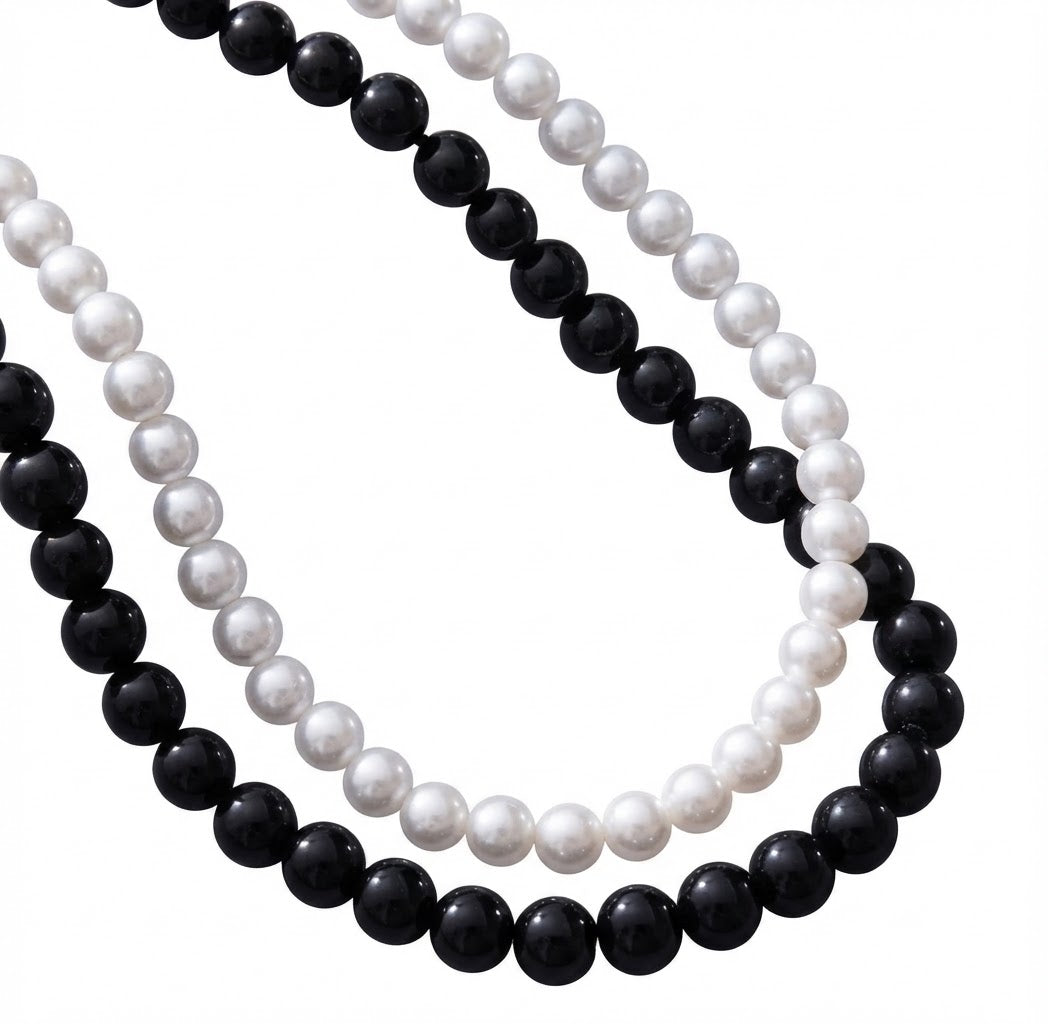 Doppia collana in perle bianca e nera