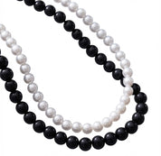 Doppia collana in perle bianca e nera
