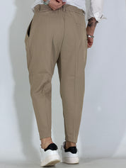 Nomad · Pantalone carrot con pince beige