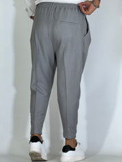 Nomad · Pantalone carrot con pince grigio chiaro
