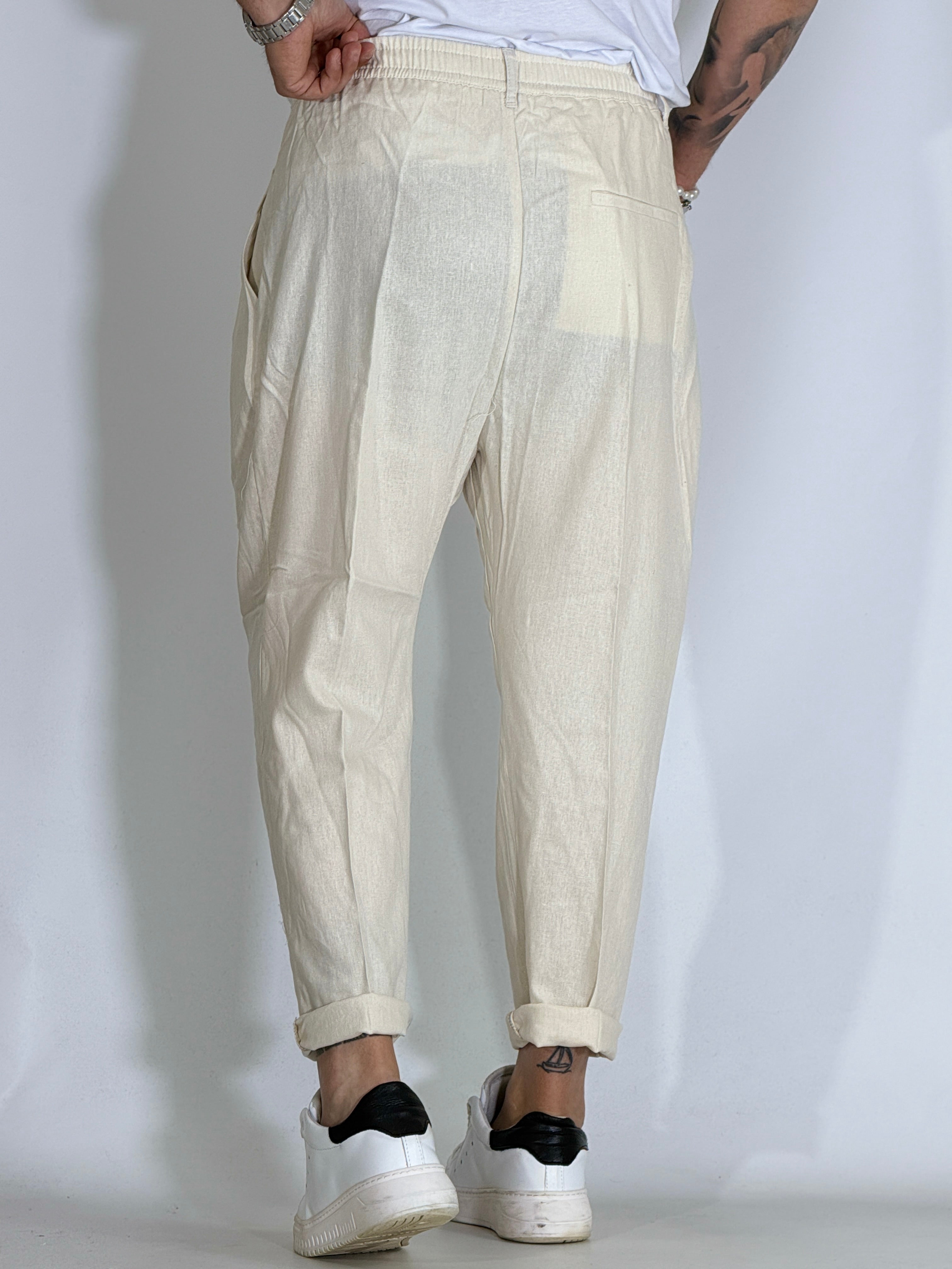 Nomad lino · Pantalone carrot con pince avorio