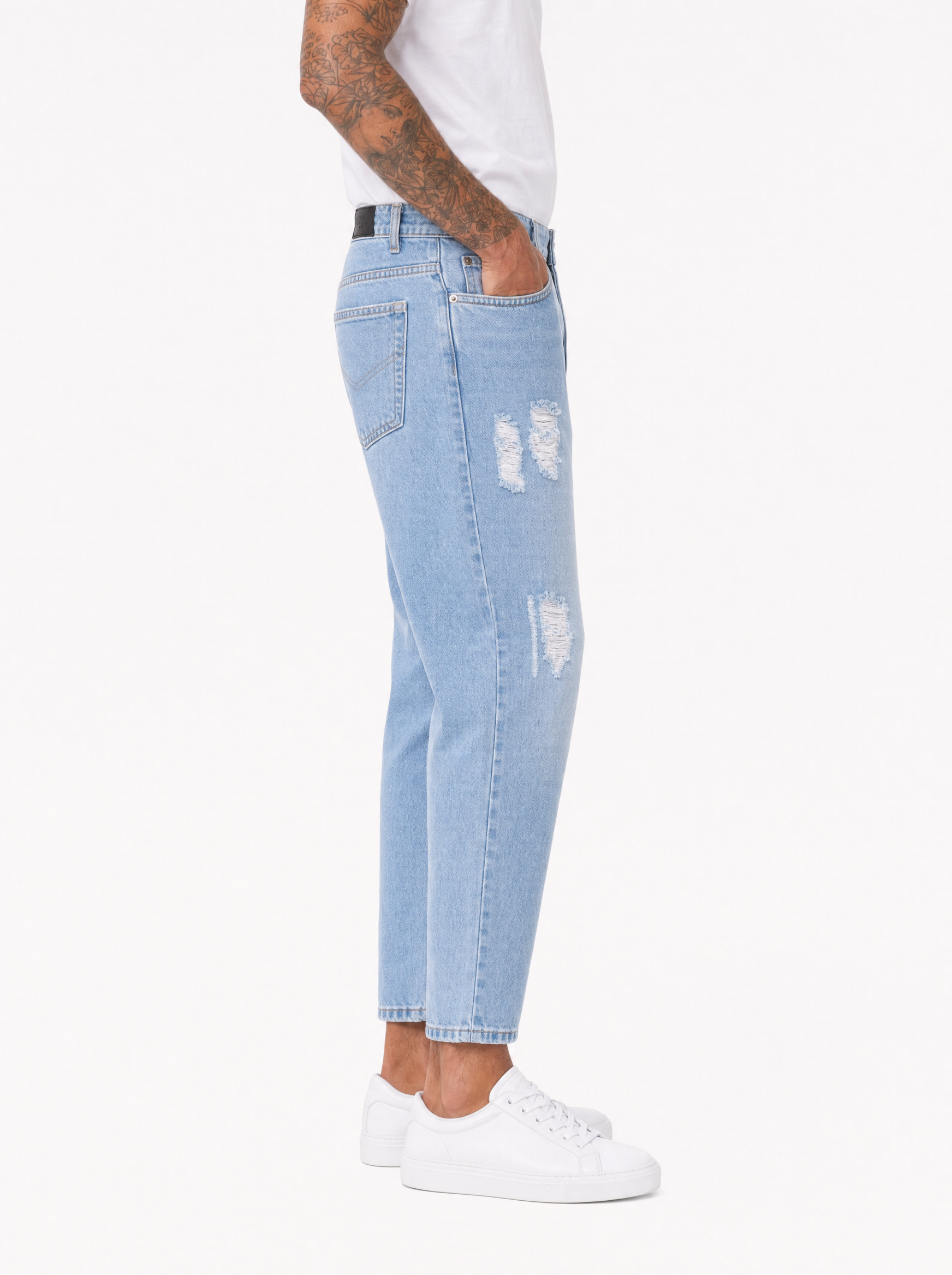 CORE Jeans carrot fit chiaro con abrasioni