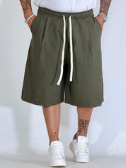Bermudone con pinces verde REGO10