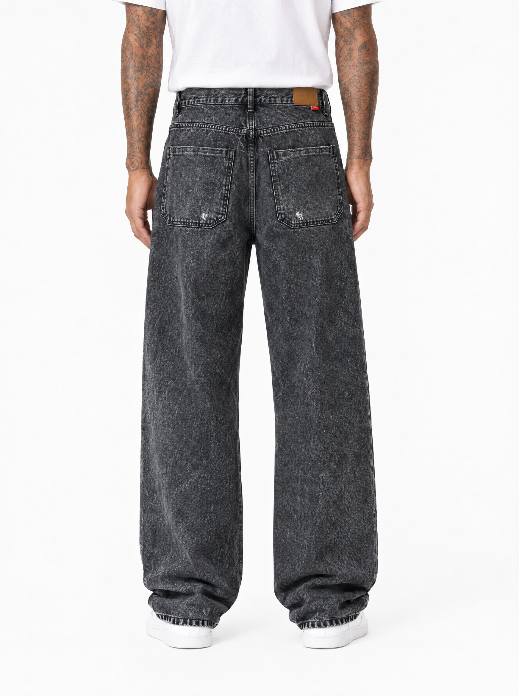 TANGERI jeans baggy fit con abrasioni cenere