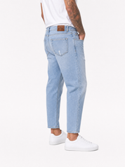 CORE Jeans carrot fit chiaro con abrasioni