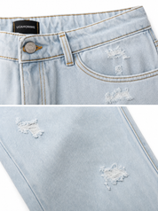 Jeans carrot fit con rotture chiaro MRC11